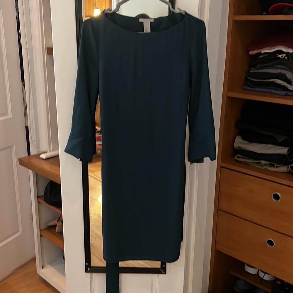 Mid length formal dress. Perfect for business casual or formal occasions